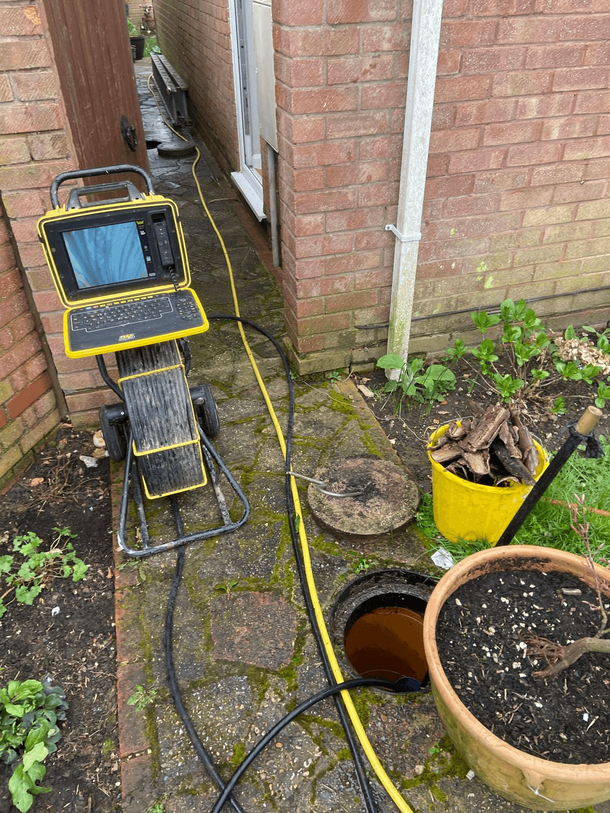 CCTV drain survey equipment in use